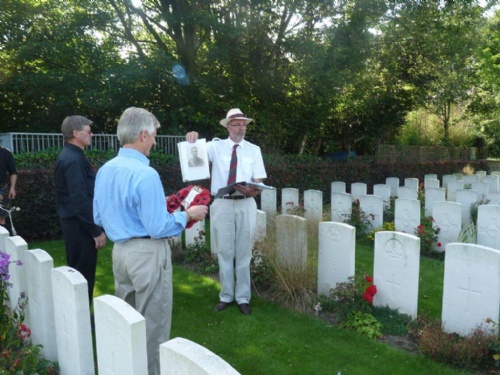 5 TMYS Tank Tour - Guide Mr. Lock in Oxford Road CWGC Cemetery, at grave of Capt. Robertson, VC
